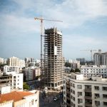 Building under construction much taller than surrounding area